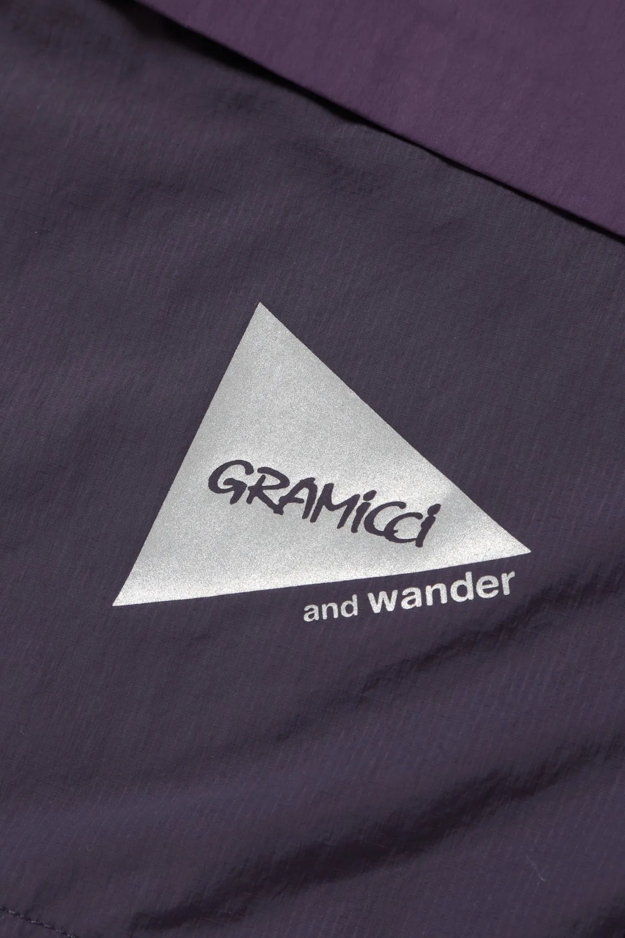 Gramicci x and wander Patchwork Wind Hoodie